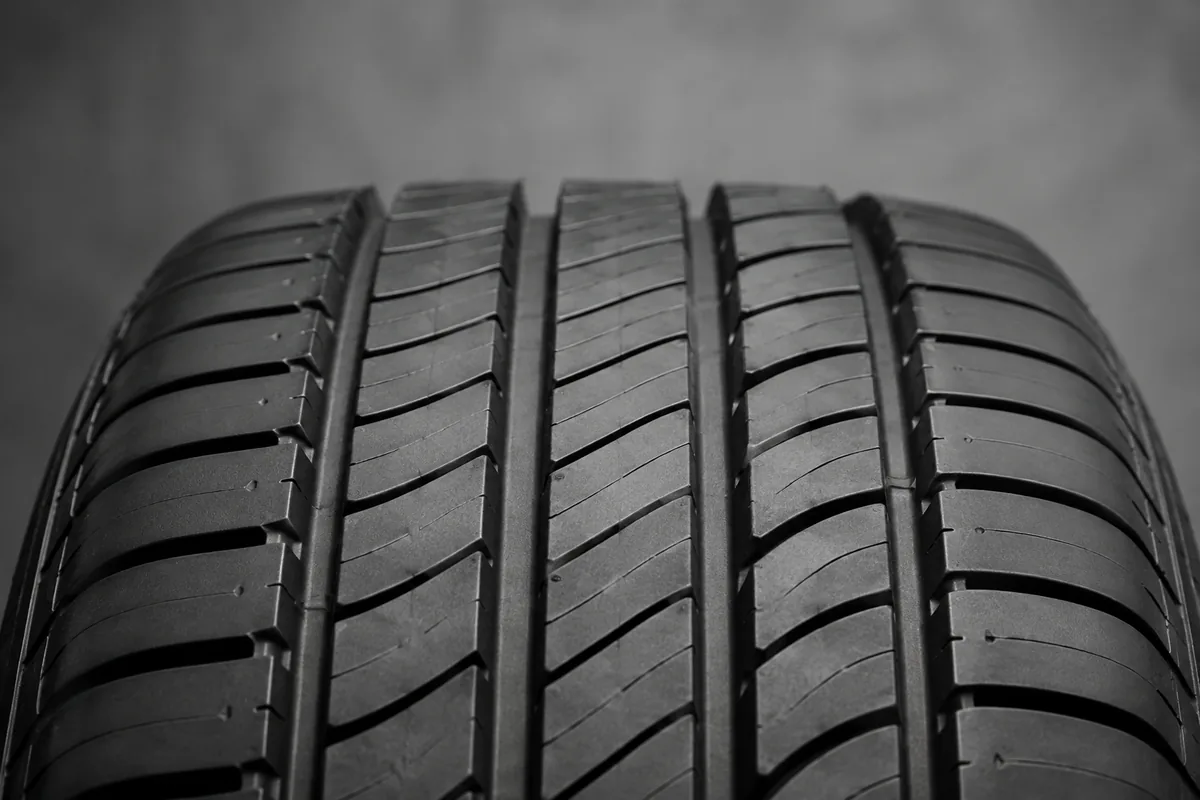 Illustration: A close view of rubber grooves and siping illustrates tread features.