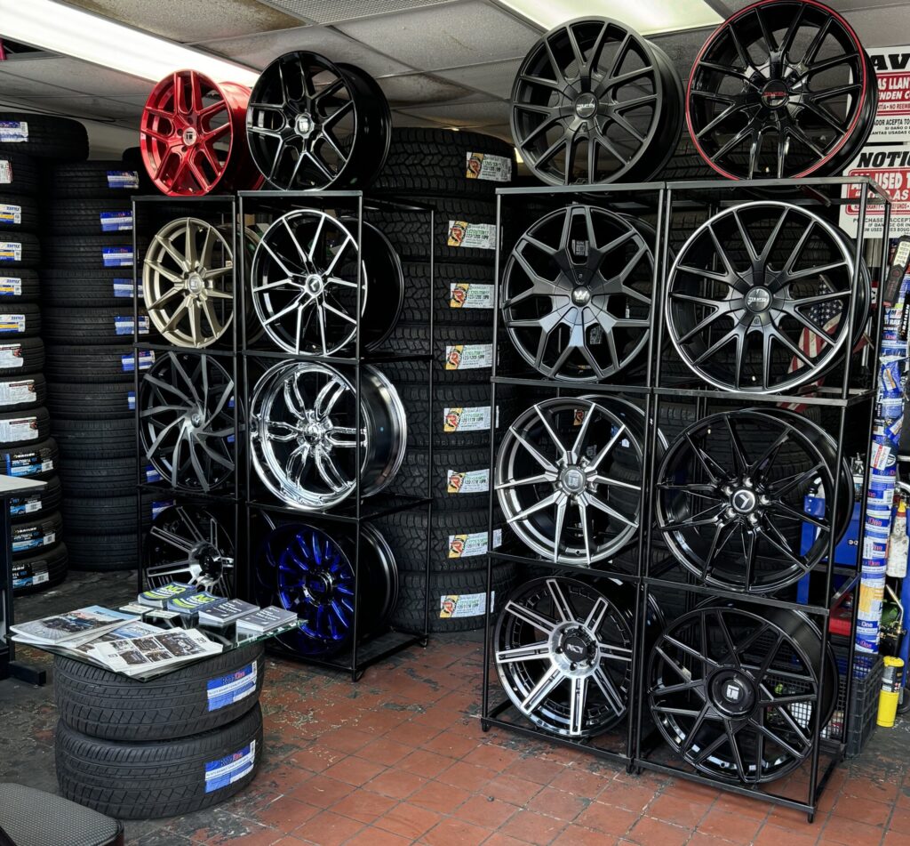 Display of custom alloy wheels and rims inside Titan Tire and Wheels shop in Madison, TN