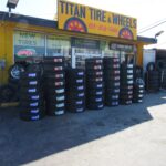 Stacks of new tires in front of Titan Tire and Wheels store in Madison, Tennessee