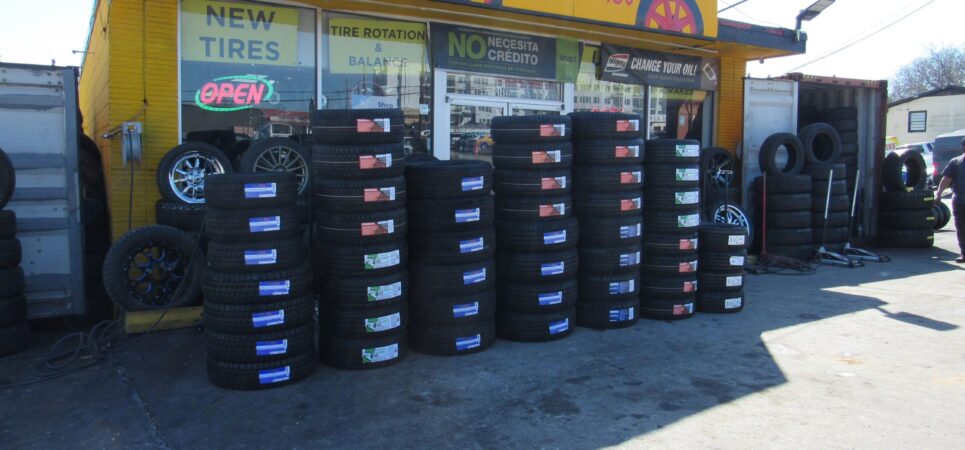 Stacks of new tires in front of Titan Tire and Wheels store in Madison, Tennessee