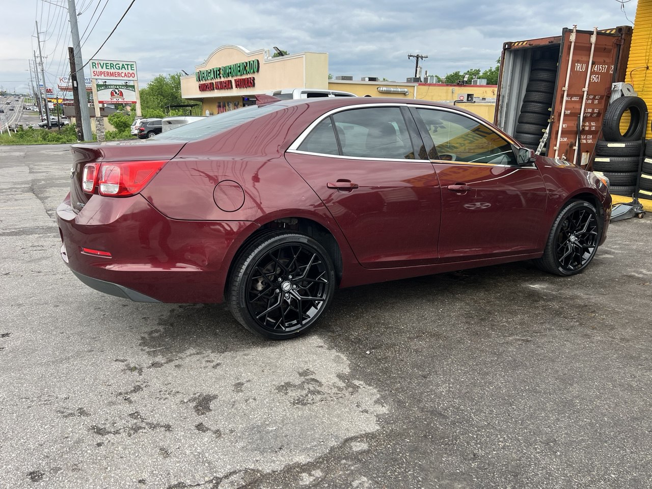 Chevy Malibu custom wheels installed with black rims
